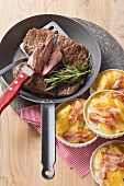 Rindersteak mit Speck-Gratin