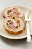 Pork roulade stuffed with almonds and raisins
