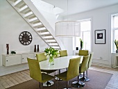 Dining room, stairs in background