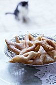 Beignets (French fried pastries) with icing sugar