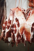 Sections of saddle of lamb at a market