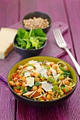 Spaghetti with chick-peas, celery, spinach, tomatoes and Parmesan