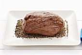 Seared beef fillet with crushed peppercorns