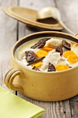 Soup with dried mushrooms, carrots and potato noodles