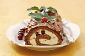 Chocolate sponge roll with cranberries for Christmas