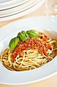 Spaghetti bolognese with basil