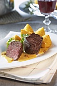Medallions of venison with croquettes