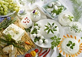 Various kinds of fresh cheese with herbs