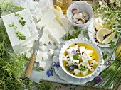 Feta cheese with olive oil, herbs and pink peppercorns