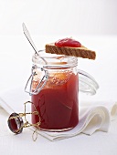 Strawberry spread with Prosecco in jar and on toast triangle
