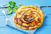 Apple pancakes with icing sugar