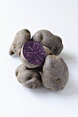 Several purple potatoes