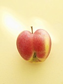 Heart-shaped red apple