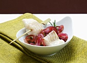 Fish fillet with red wine onions