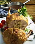 Duck stuffed with ceps, halved