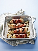 Prosciutto-wrapped chicken with potatoes