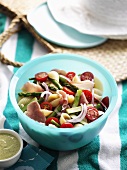 Pasta and vegetable salad with prosciutto