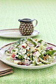 Waldorf salad with spinach and walnuts