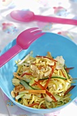 Pasta and vegetable salad with almonds