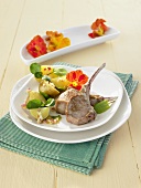 Lamb cutlets and potato salad with herbs