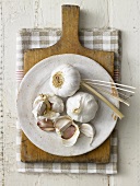 Garlic bulbs and cloves on a plate