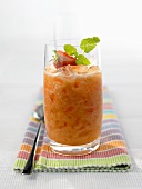 Tropical smoothie made with papaya and mango