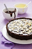 Chocolate tart with flaked almonds