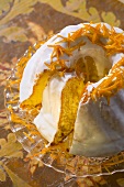 Iced wreath cake with orange zest for Easter (Poland)