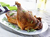 Roast goose legs with herbs