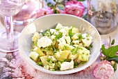 Summery potato salad with feta cheese and herbs