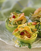 Salmon salad with caviar in apple baskets