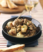 Blanquette of veal with onions and mushrooms
