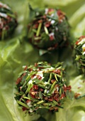 Soft cheese balls coated in herbs