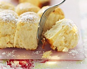 Buchteln (yeast dumplings) with icing sugar