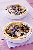 Apple tartlets with raisins and lavender flowers