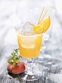 Peach and Prosecco drink with thyme