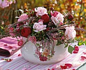 Arrangement of roses, heather and hydrangeas