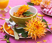 Breakfast place-setting with cornflakes and dahlias