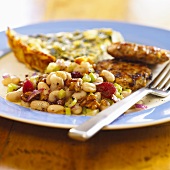 White bean salad with spinach quiche and burgers