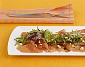 Marinated tuna with rocket and pine nuts