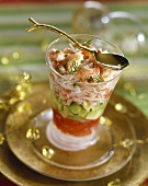Shrimp salad with avocado and tomato coulis
