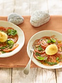 Warm tomato salad with fried boiled egg