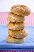 Five home-made bread rolls, stacked
