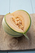 A Charentais melon with a section removed