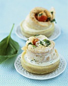 Sole rolls with basil on artichoke bottoms