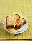 Slices of brioche with almonds