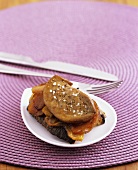 Fried goose liver with apple on toasted bread