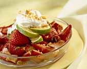 Strawberry salad with lime, cream and amaretti crumbs