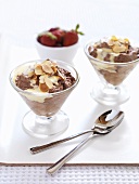 Chocolate mousse with custard and flaked almonds