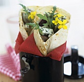 Wraps filled with cheese and rocket